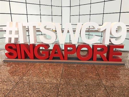Kongressin logo, jossa lukee #ITSWC2019 Singapore