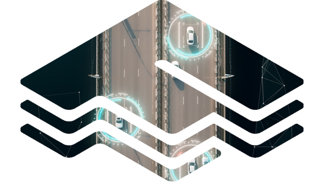 F-kirjainlogo, jonka sisällä ilmakuvaa maantiestä ja autoista